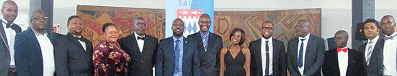 Dignitaries and committee members attending the banquet:  Minister of Transport & Communications, Honourable Mr Brian Mushiba (sixth from left); Branch Chairman, Zambia, Enock Shikabeta, (fifth from left) and then-President of the SAIMC, Oratile Samatle (fifth from right).